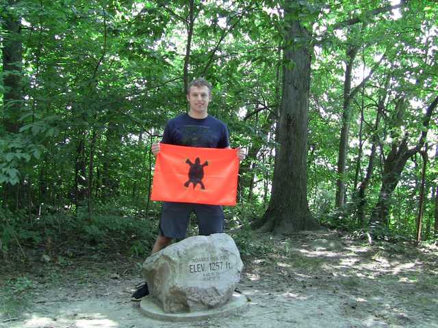 Hoosier Hill elevation boulder in the woods