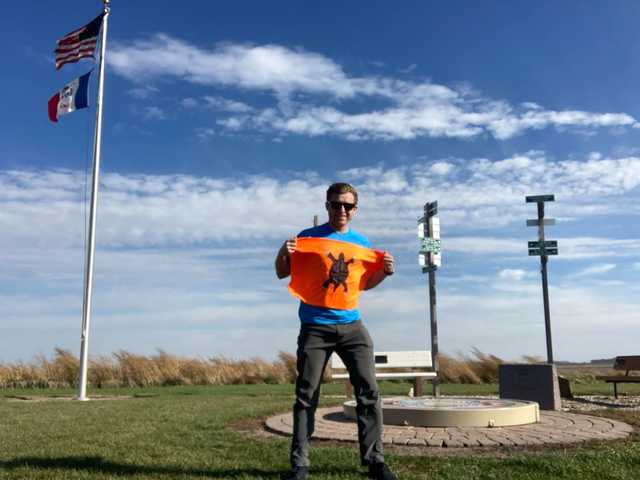 Hawkeye Point with the U.S. and Iowa flags flying overhead