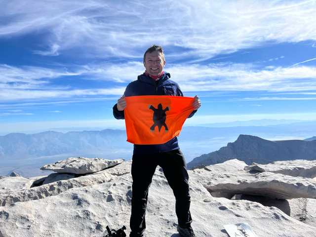 Granite summit of Mount Whitney with the Sierra Nevada behind